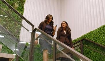 Employees walking down stairs