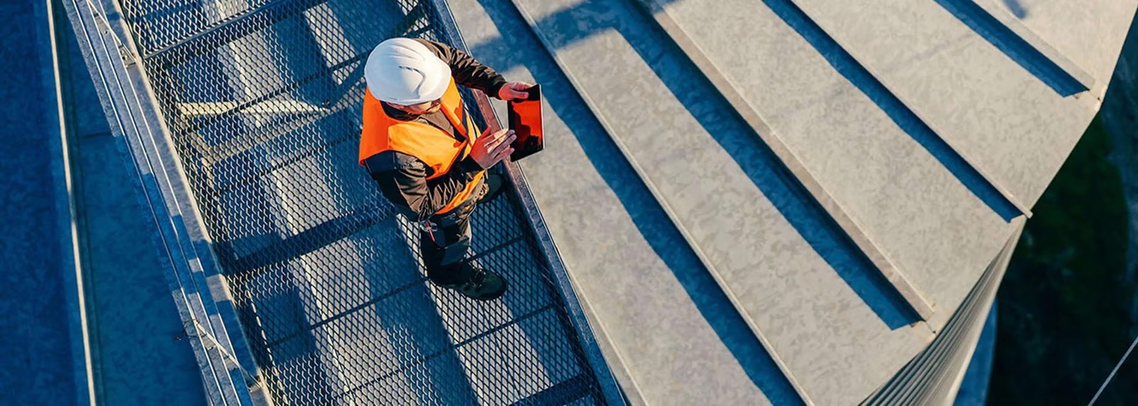 Construction worker on top of a building