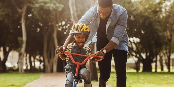 Father with son on bike